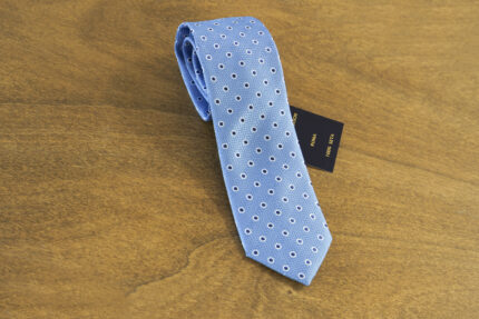 Cravatta a pois fondo celeste mod. 109